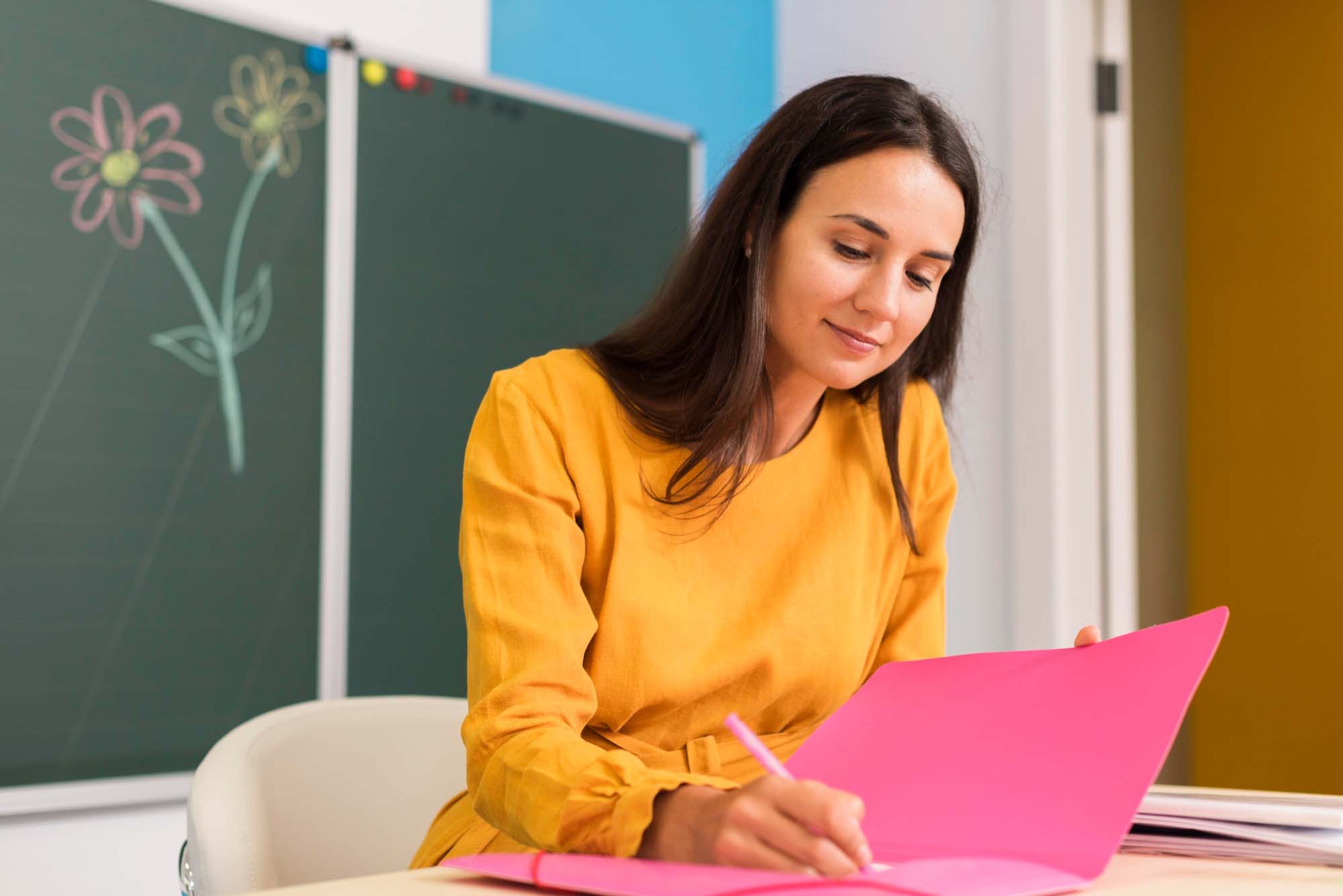 Teacher Taking Notes