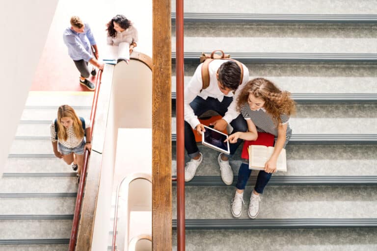 kids in the school stairway